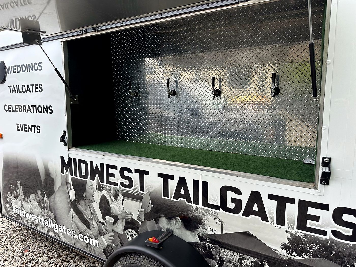 The mobile tap trailer's four-tap beer window
